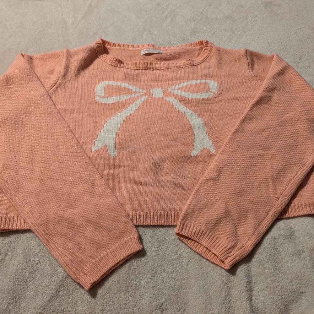 Peach Sweater with Bow Design